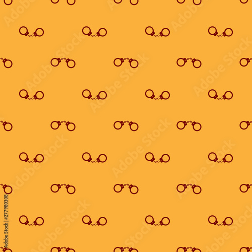 Red Handcuffs icon isolated seamless pattern on brown background. Vector Illustration