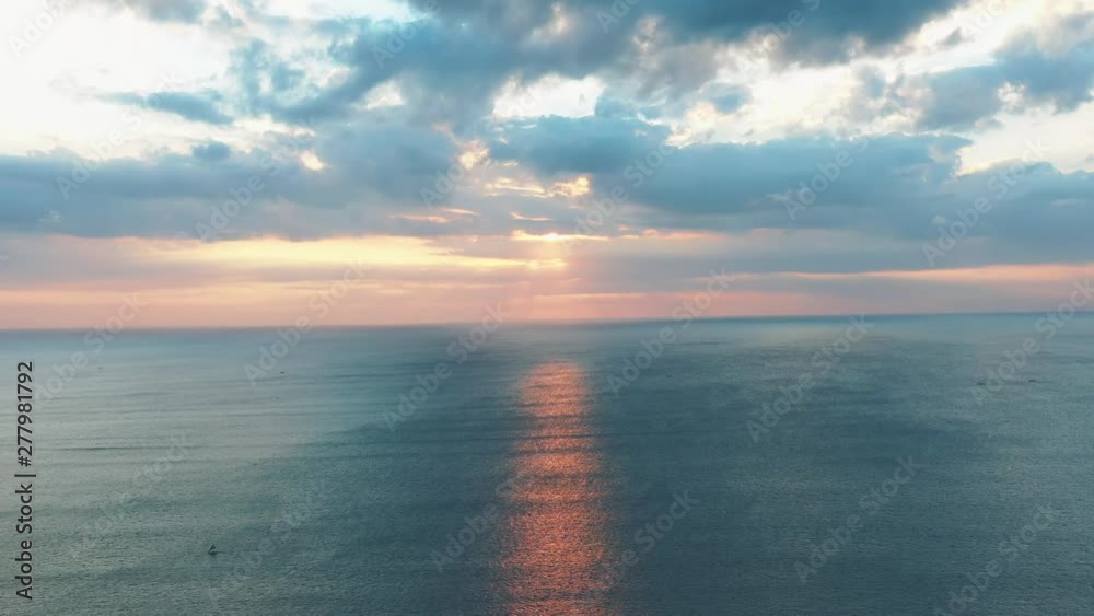 Beautiful Sunset on Jimbaran beach on Bali island. Aerial video from the drone. Beautiful Sunset on Jimbaran beach on Bali island. Aerial video from the drone.