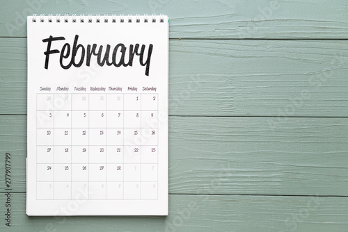 Flip paper calendar on wood...