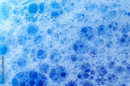 foam bubbles.blue soap bubbles background. Texture Foam Close-up.
