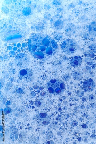 foam bubbles.blue soap bubbles background. Texture Foam Close-up.Foam Water Soap Background.