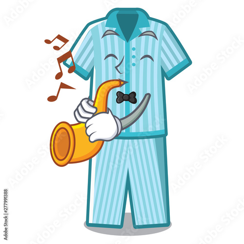 With trumpet pyajamas placed on a cartoon bed