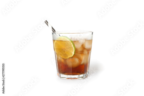 Glass of cold cola with lime isolated on white background