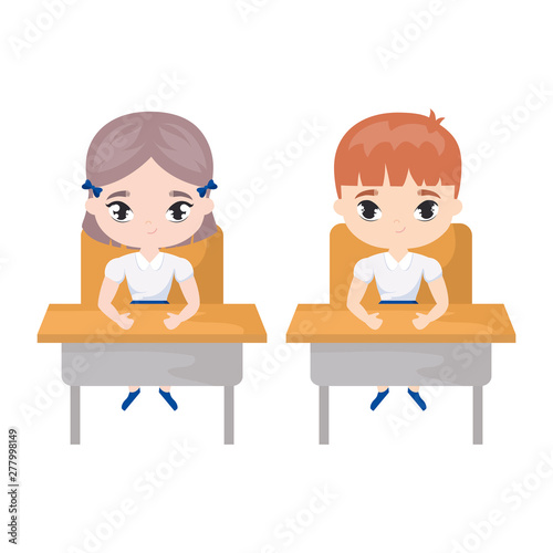 little students seated in school desks