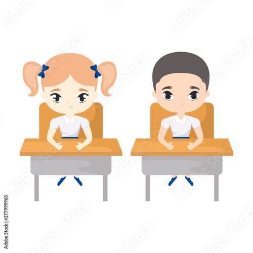 little students seated in school desks