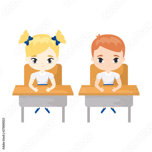 little students seated in school desks