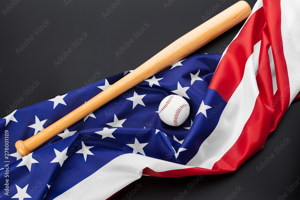 baseball and baseball bat with American flag on the black background