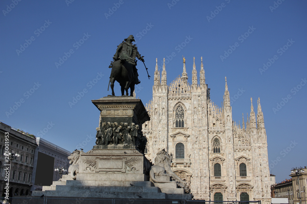 The Piazza del Duomo milano, Famous white Architectural cathedral church under blue sky at Milan, The largest church in Italy, travel destination backgrounds