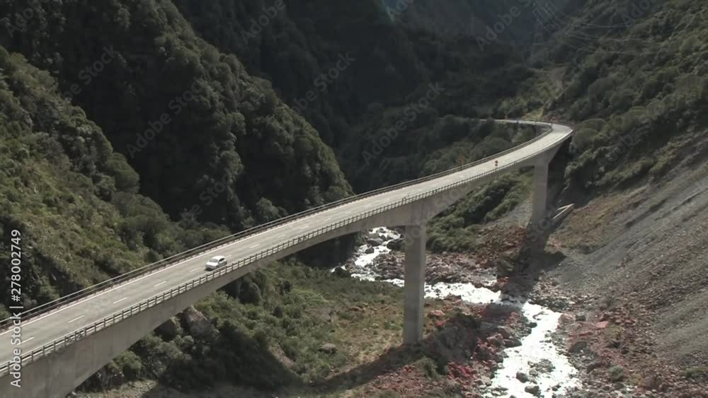 Viaduct, zoom out. Car. Viaduct, zoom out. Car.