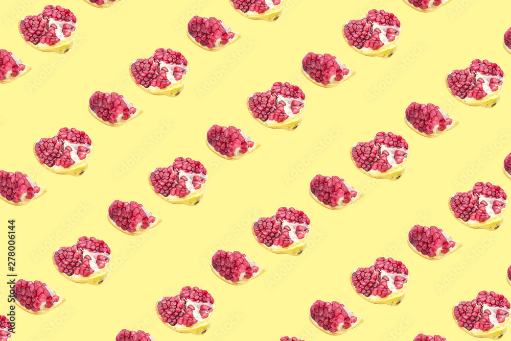 Fruit pattern of Pomegranates on yellow background. Fruit pattern of Pomegranates on yellow background.