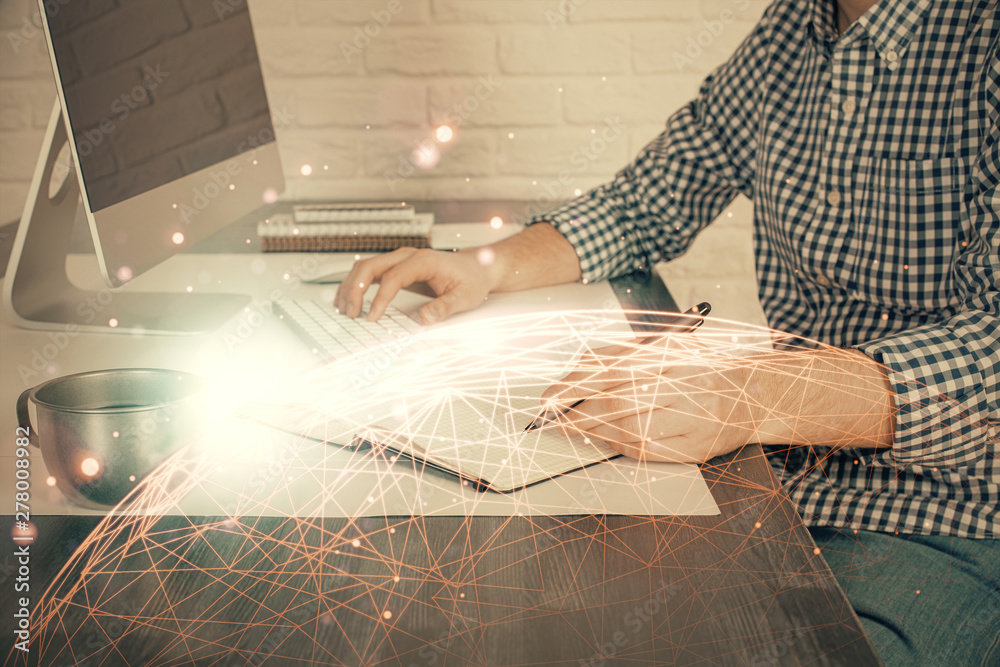 Fototapeta premium Social network theme hologram with businessman working on computer on background. Concept of world wide web. Double exposure.