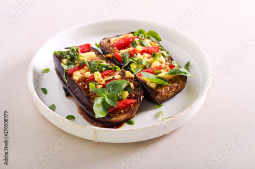 Eggplant stuffed with cheese and tomato
