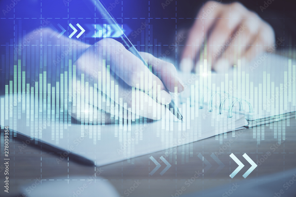Forex graph on hand taking notes background. Concept of research. Multi exposure Forex graph on hand taking notes background. Concept of research. Multi exposure
