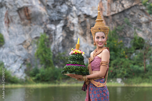 beautiful thai model wearing thai traditiomal loy kratong festival photo