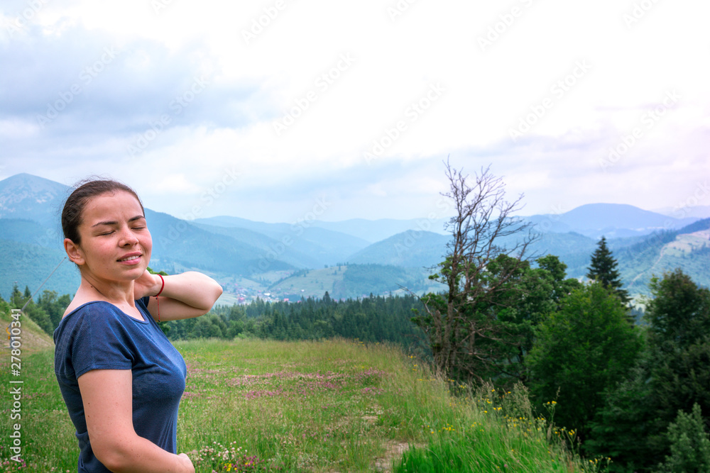 girl in forest breathe fresh air.  Mountain landscape