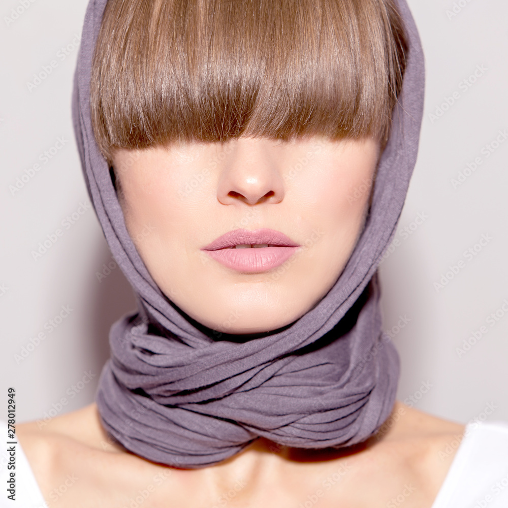 Close up portrait of woman wearing scarf. Autumn beauty Close up portrait of woman wearing scarf. Autumn beauty