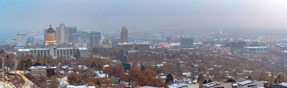 Panoramic view of the bustling Salt Lake City downtown on a cloudy winter day