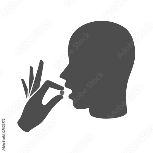 Taking the medicine pill icon concept. Head with open mouth and a hand holding a circle shaped pill