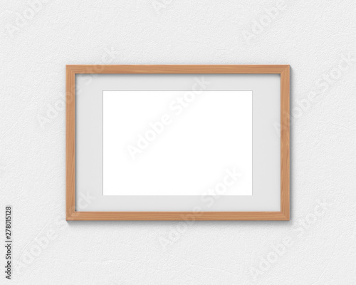 Horizontal wooden frames mockup with a border hanging on the wall. Empty base for picture or text. 3D rendering. © photolas