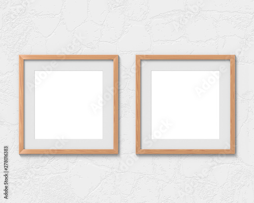Set of 2 square wooden frames mockup with a border hanging on the wall. Empty base for picture or text. 3D rendering.