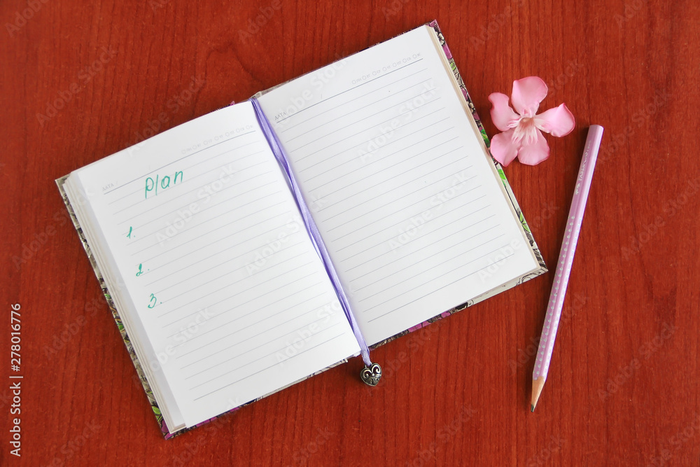 Notebook for business and notes with white pages and pencil, penster Notebook for business and notes with white pages and pencil, penster