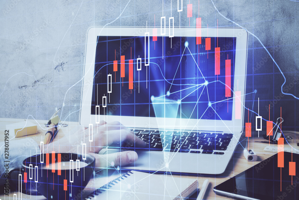 Forex graph with businessman working on computer in office on background. Concept of hardworking. Double exposure. Forex graph with businessman working on computer in office on background. Concept of hardworking. Double exposure.