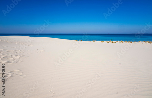 white sand dunes of Is Arenas and blue sea in Sardinia