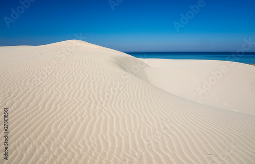 white dunes of Is Arenas and blue sea in Sardinia