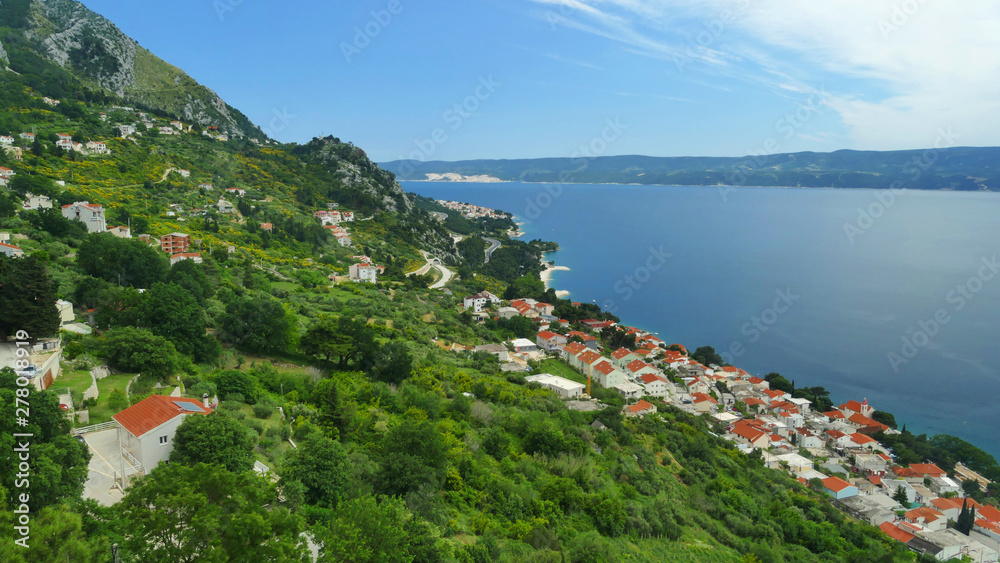 Panorama view of Makarska Riviera Coast with channel near Omis, Croatia