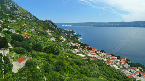 Panorama view of Makarska Riviera Coast with channel near Omis, Croatia