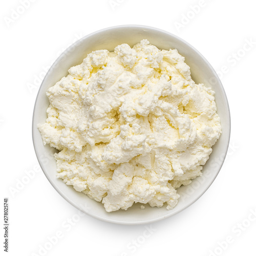 Cottage cheese or tvorog in a bowl isolated on white background. Top view. Rich in Calcium and Protein healthy food