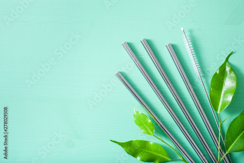 eco-friendly reusable metal drinking straw. zero waste concept photo