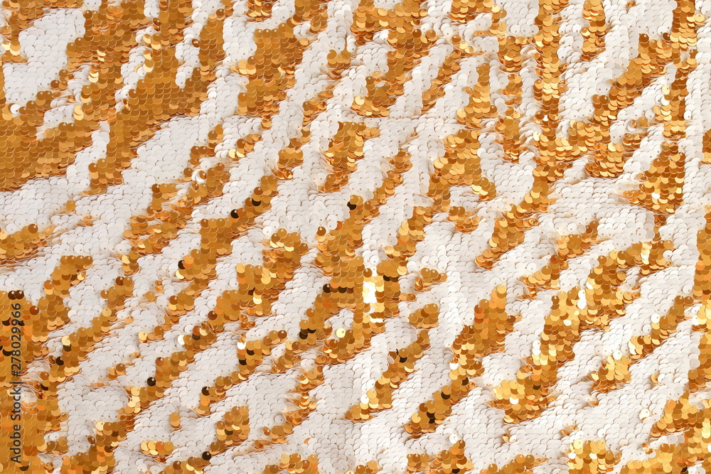 Sequins fabric texture golden white color . Abstract Xmas, festive sparkling background. Sequins fabric texture golden white color . Abstract Xmas, festive sparkling background.