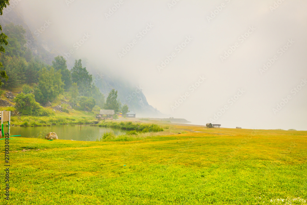 Foggy summer landscape in Norway