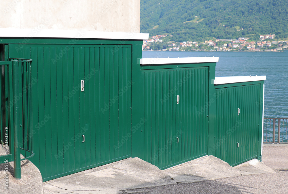 Fototapeta premium Closed garage doors on lake coast