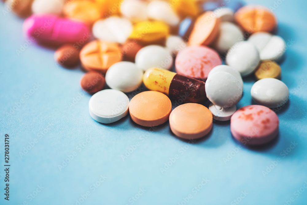 Pills and capsules, social issue, medicine and the pharmaceutical industry Pills and capsules, social issue, medicine and the pharmaceutical industry