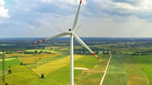 Wind turbines on fieldin summer, aerial view in Poland photo