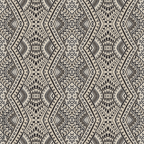 Vector abstract seamless pattern from black, grey and light beige ikat geometrical shapes, rhombus, triangles, Maori ornaments, waves, stripes. Textile print, Wrapping paper, wallpaper. Batik paint photo