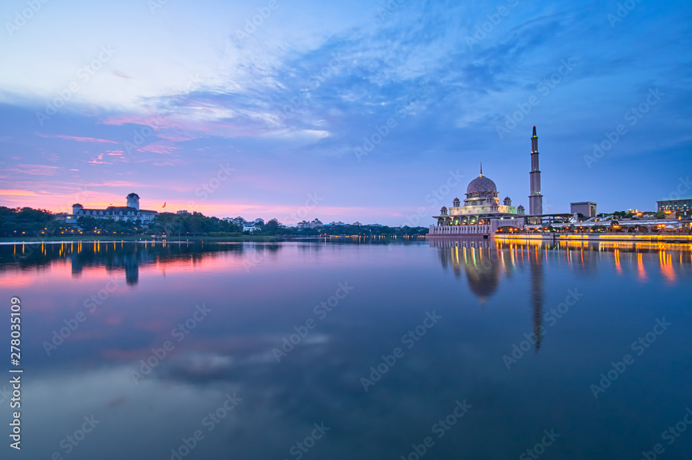 Selangor, Malaysia, June 18, 2019 : Silhouettes view of sunset at Putra Mosque or Masjid Putra Putrajaya Malaysia during haze and bad weather. Selective focus