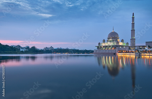 Selangor, Malaysia, June 18, 2019 : Silhouettes view of sunset at Putra Mosque or Masjid Putra Putrajaya Malaysia during haze and bad weather. Selective focus photo