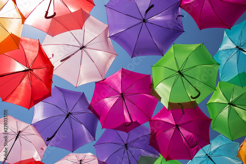 Colorful umbrellas background. Street decoration in France.