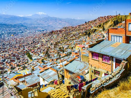 Slum houses built in steep of La Paz, Bolivia photo