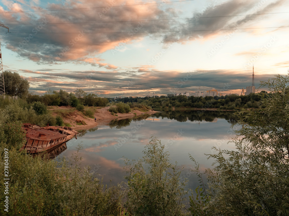 Obraz premium GOMEL, BELARUS old rusty metal river barge on the bay