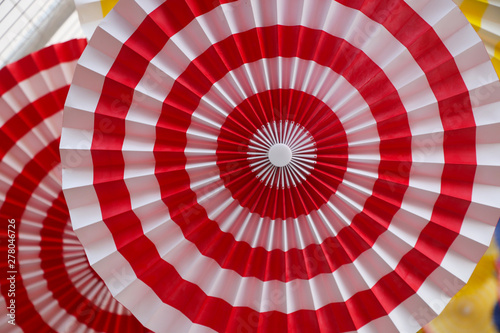 Paper fan red and white color abstract background decorate at department store in summer season
