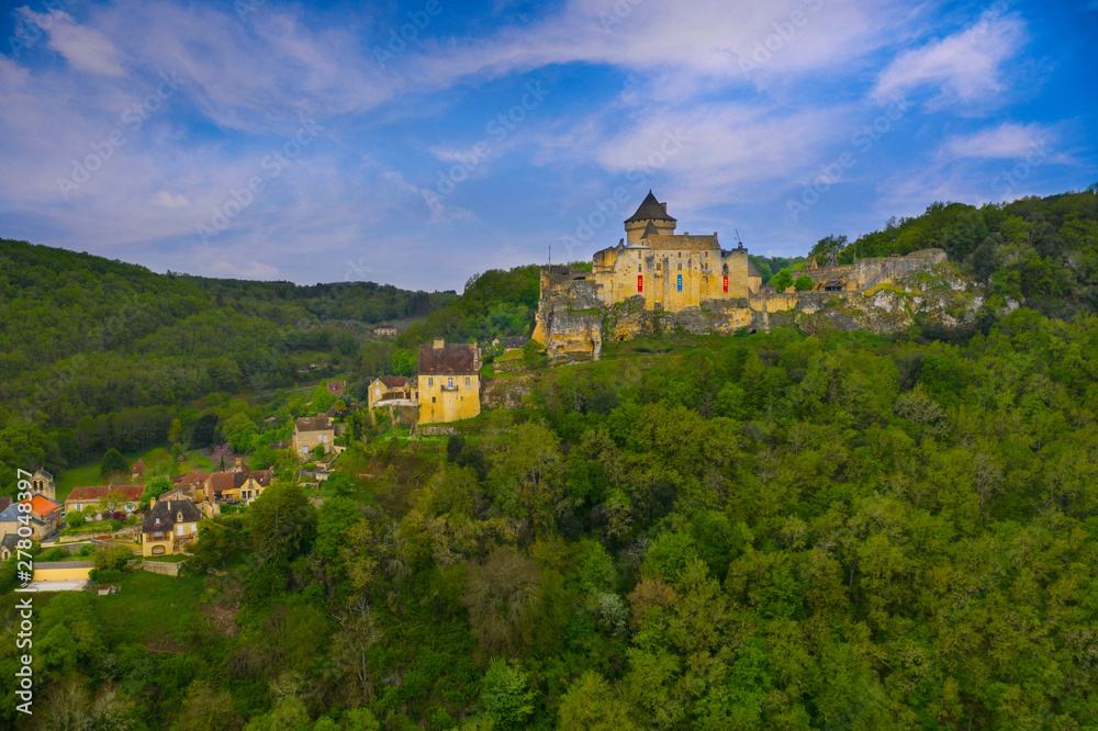 Aerial panorama of a medieval chateau in Castelnaud - La Chapelle. The village and castle are located above the confluence of the two rivers. Dordogne department in Nouvelle-Aquitaine in southwestern 