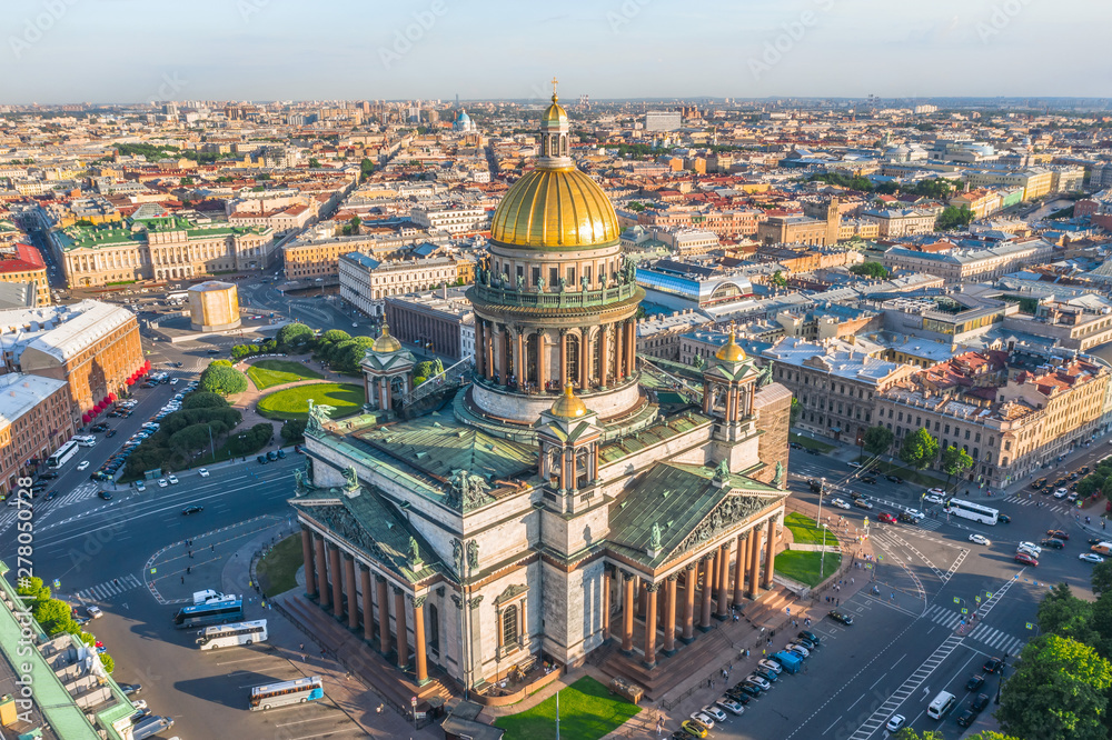 Aerial view of St. Isaac's Cathedral and the historic part of the city of Saint-Petersburg evening sunlight.