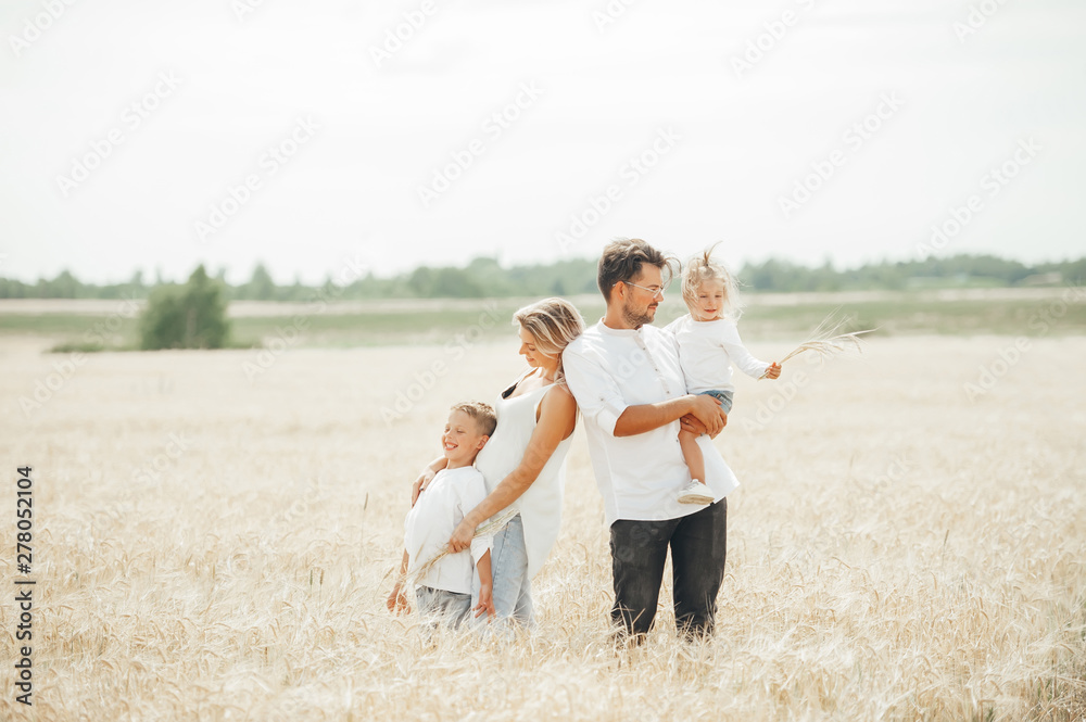 Portrait of a happy and fun family in the countryside. Portrait of a happy and fun family in the countryside.
