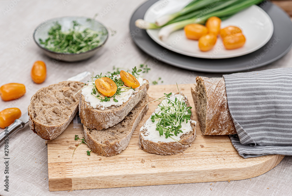 Toast with cream cheese and micro salad, healthy food concept Toast with cream cheese and micro salad, healthy food concept