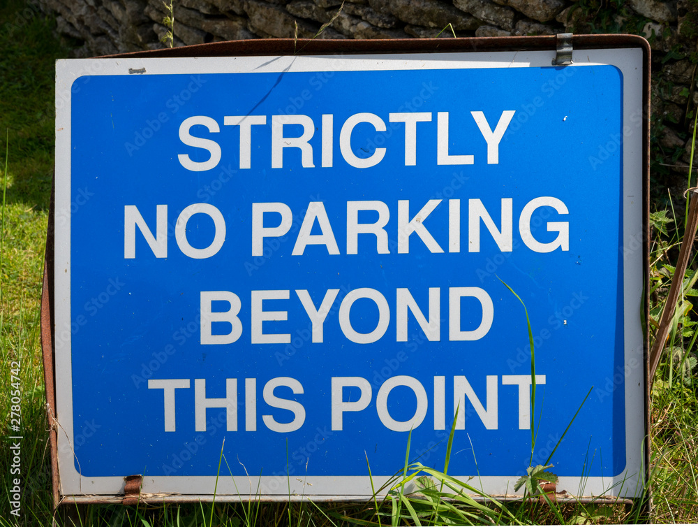 Blue and white No Parking sign