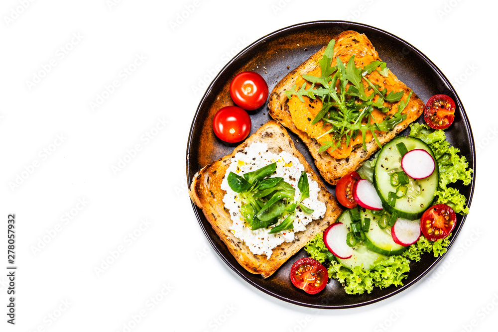 Breakfast - sandwiches with vegetable salad Breakfast - sandwiches with vegetable salad